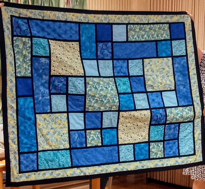 Wendy - quilt made with blue scraps